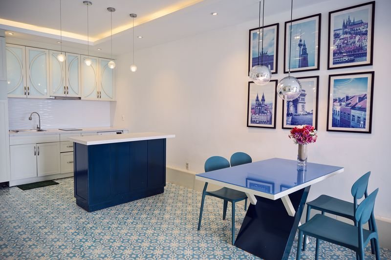 Full kitchen with island seating and dining area