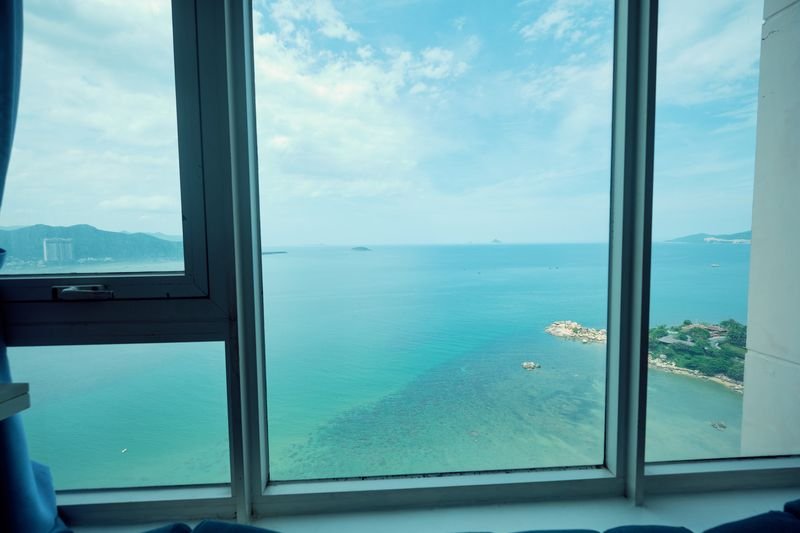 View from the apartment over the green Hon Chong headland and turquoise sea
