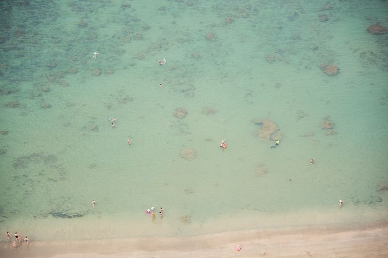 Turquoise water and coral reef patterns seen from the window